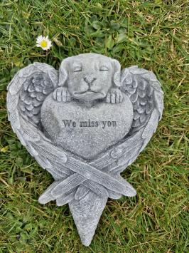 Grabsteindekoration für einen Hund