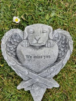 Grabsteindekoration für einen Hund