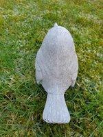 Lief tuinbeeldje van een mus , vogel