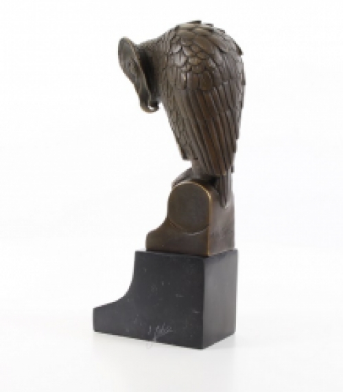 Een bronzen beeld/sculptuur van een uil