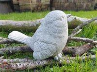 Lief tuinbeeldje van een mus , vogel