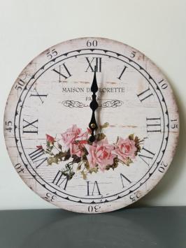 wandklok , klok met rozen