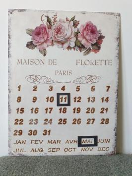 Kalender van metaal , roze bloemen