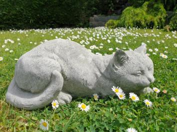 Gartenstatue einer Katze, Gänseblümchen