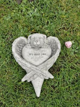 Grafdecoratie voor een hond , beton