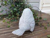 Lief tuinbeeldje van een mus , vogel